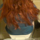 A girl with reddish hair pees, wipes herself, repositions the camera and has a wet, explosive shit with juicy farts while sitting on a toilet. She comments on the bad smell. No poop actually seen, but some nice sounds. About 5 minutes.